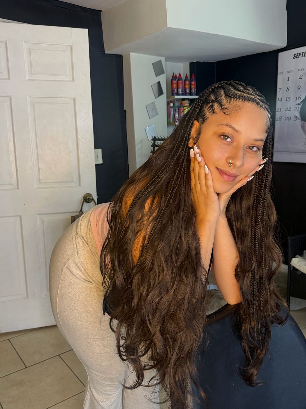 Stitch braids with long wavy hair
